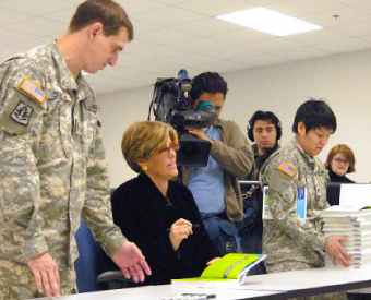 Suze working with military