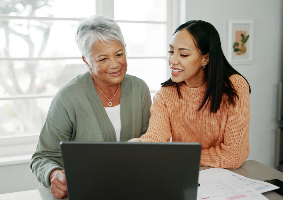 woman and mom looking at computer