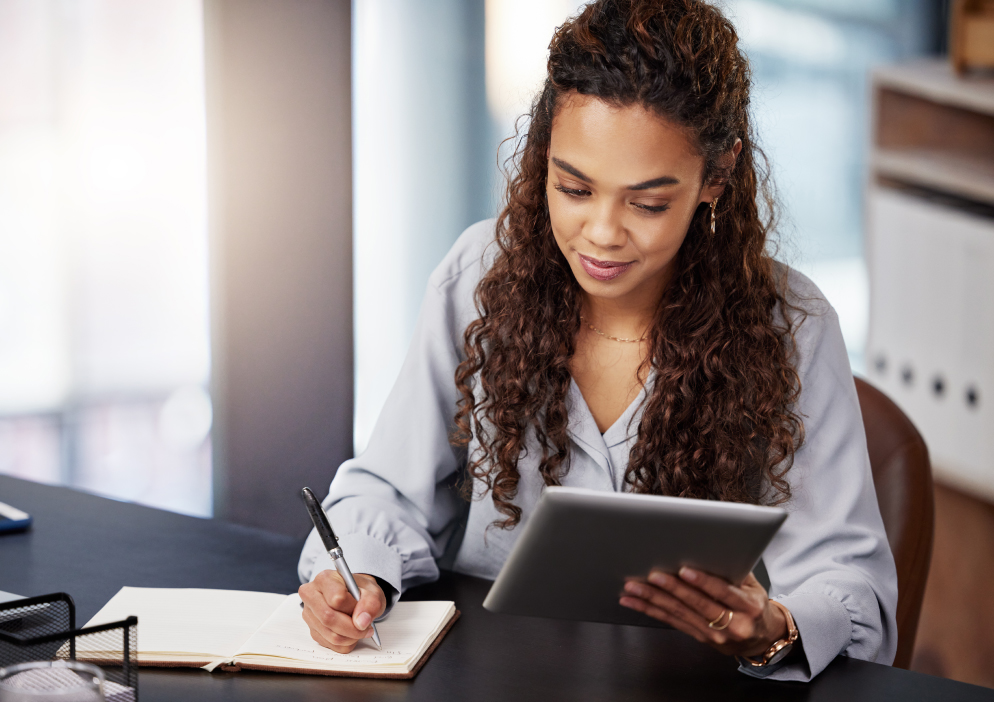 woman taking notes